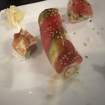 Soya - Watermelon Roll, the smaller piece is Crunching Tiger Roll - Sushi Bars Near Me - Virginia Beach, Virginia Soya - Watermelon Roll, the smaller piece is Crunching Tiger Roll - Sushi Bars Near Me - Virginia Beach, Virginia