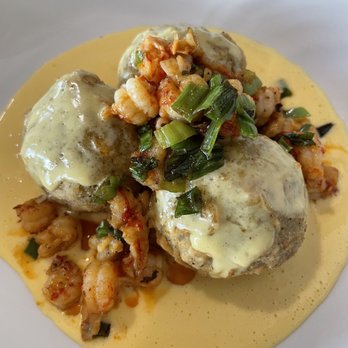 Spoke & Hub - Seafood Eggplant Balls topped with crawfish and hollandaise - Breakfast & Brunch Near Me - Baton Rouge, Louisiana