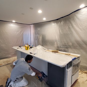 Franky's Painting Service - Spraying kitchen island. - Painters Near Me - Allentown, Pennsylvania Franky's Painting Service - Spraying kitchen island. - Painters Near Me - Allentown, Pennsylvania