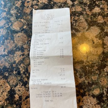 El Taquito - a receipt on a table - Mexican Near Me - Austin, Texas