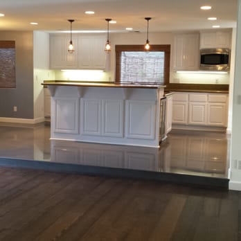 Floor Zone - Decorative concrete and engineered hardwood flooring looks AMAZING! (And our refinished kitchen cabinets tie everything together!) - Flooring Near Me