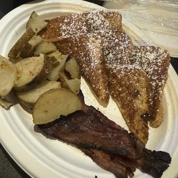 Timbers Log Cabin - Timbers Log Toast with choice of sides (bacon or sausage and grits or house potatoes) - Sandwiches Near Me - Gatlinburg, Tennessee Timbers Log Cabin - Timbers Log Toast with choice of sides (bacon or sausage and grits or house potatoes) - Sandwiches Near Me - Gatlinburg, Tennessee