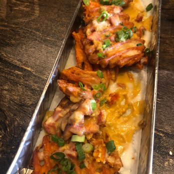 Pythagoras - Sweet potato fries covered in their vegan queso - Vegan Near Me - Sugar Land, Texas