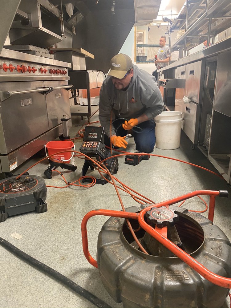 Slide of Hotshots Drain Cleaning