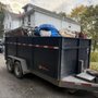 Photo of In A Skip Hauling