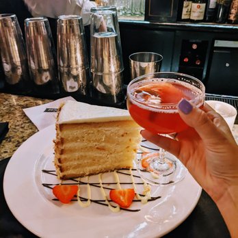 Peninsula Grill - Ultimate Coconut Cake and Sea Breeze Gimlet - New American Near Me - Charleston, South Carolina
