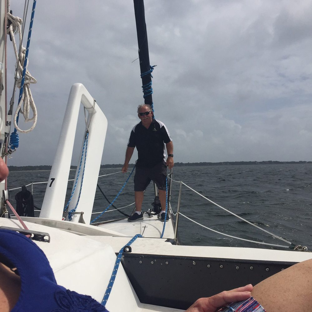Condor Sailing Adventures - Dad on the bow. - Boating Near Me - Pensacola Beach, Florida Condor Sailing Adventures - Dad on the bow. - Boating Near Me - Pensacola Beach, Florida