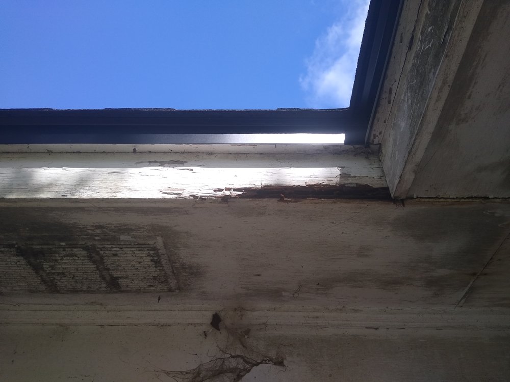 Slide of Tadlock Roofing