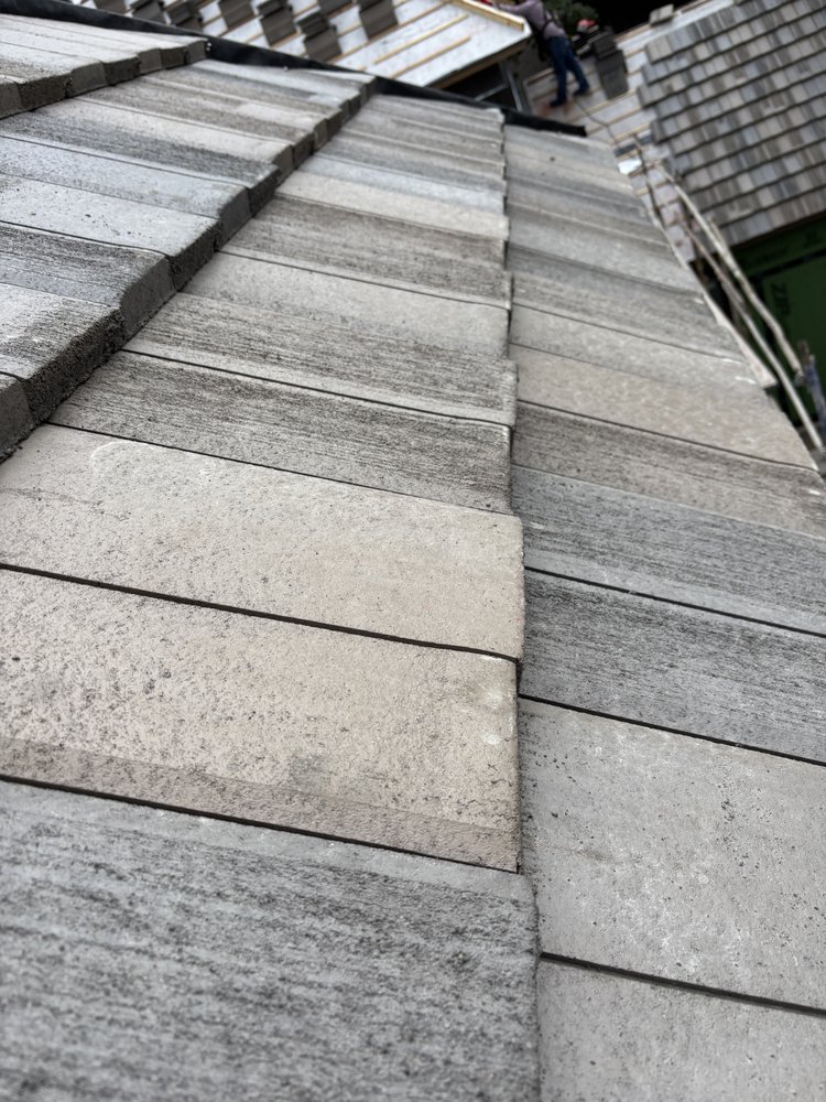 Slide of Aim High Roofing Solutions