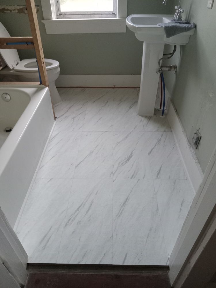 Slide of Great Scott Plumbing