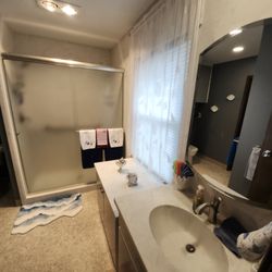 Lane Marble Interiors - Solid contoured shower base, three peice pan to ceiling surround.