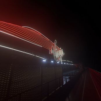 Virgin Voyages - Ship at night - Boat Tours Near Me Virgin Voyages - Ship at night - Boat Tours Near Me