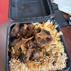 D&L Caribbean Cuisine - Oxtail platter (regular size) with rice and peas and cabbage. $19