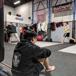 Urban Tactics Krav Maga - Assistant instructor Karch Tan contemplating what to do next.