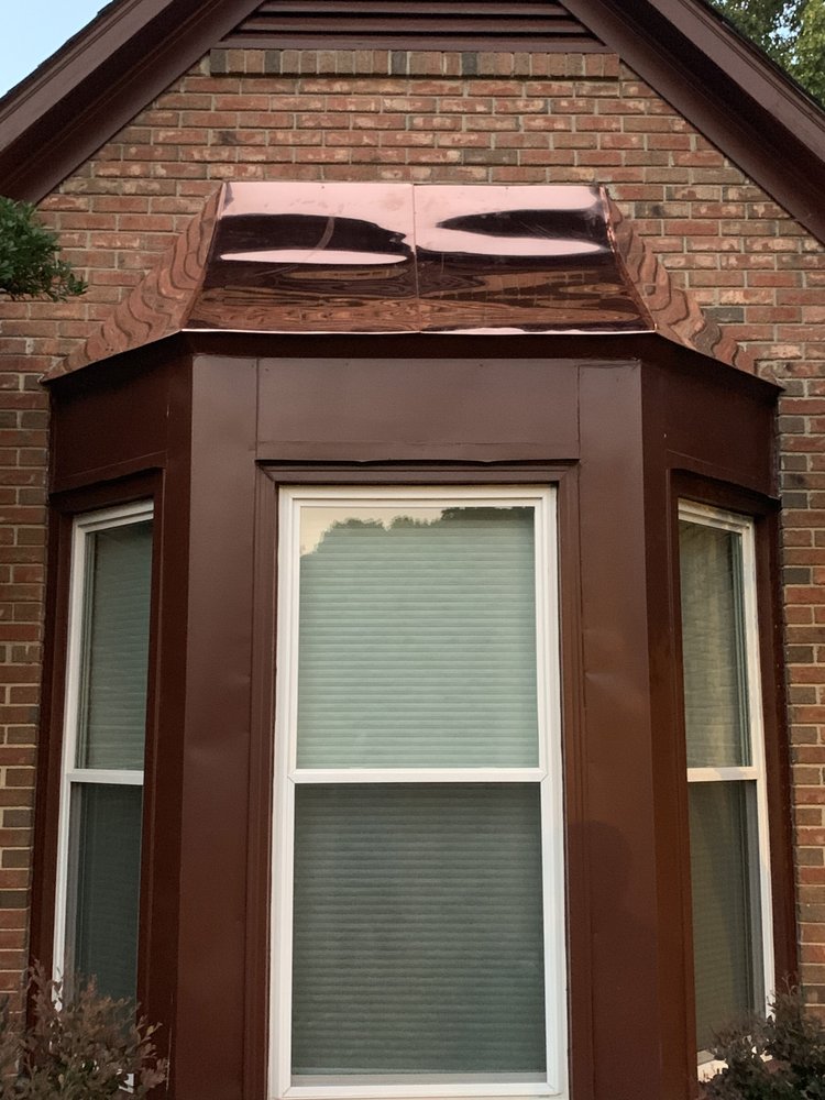 Slide of Daves Roofing