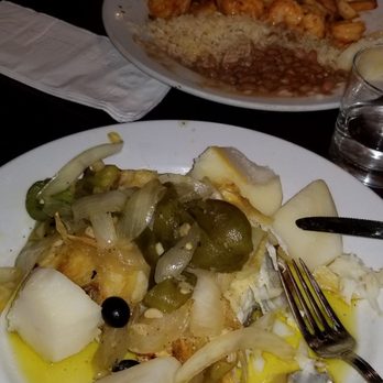 Por Do Sol - Baccala on the bone sautéed w/peppers & onions, w/boiled potatoes on the side - Sports Bars Near Me - Long Branch, New Jersey Por Do Sol - Baccala on the bone sautéed w/peppers & onions, w/boiled potatoes on the side - Sports Bars Near Me - Long Branch, New Jersey