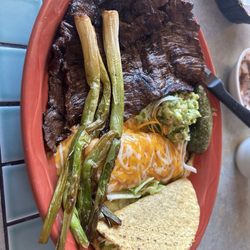 Perfectly seasoned and cooked carne asada with a taco and enchilada. Very good! Custom plate for me!