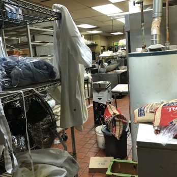 India House - A peak into the kitchen from the hallway. - Indian Near Me - Saint Paul, Minnesota
