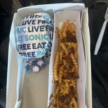 Sonic Drive-In - Large chili cheese fries; pay no attention to the begging eyes of a dog in the photo - Ice Cream & Frozen Yogurt Near Me - Lathrop, California Sonic Drive-In - Large chili cheese fries; pay no attention to the begging eyes of a dog in the photo - Ice Cream & Frozen Yogurt Near Me - Lathrop, California