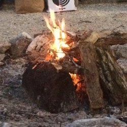 Slumber Falls Camp - The campfire behind Kelsey's Lodge