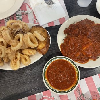 Randazzo's Clam Bar - Fried Calamari with hot sauce on the side and scungilli with hot sauce on top - Seafood Near Me - Brooklyn, New York