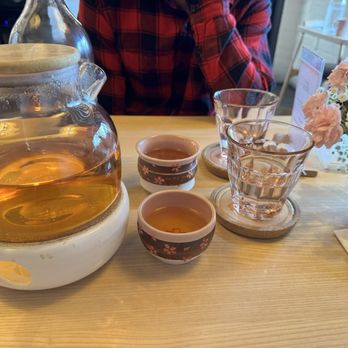 Hatsuzakura - We got the cherry blossom tea. Smooth and soothing and light. You can take it to go in a cup if you dont finish it - Japanese Near Me - San Diego, California