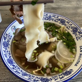 LAN Noodle - Signature LAN Noodle with thick N5 (wide flat noodles) - Chinese Near Me - Arcadia, California LAN Noodle - Signature LAN Noodle with thick N5 (wide flat noodles) - Chinese Near Me - Arcadia, California