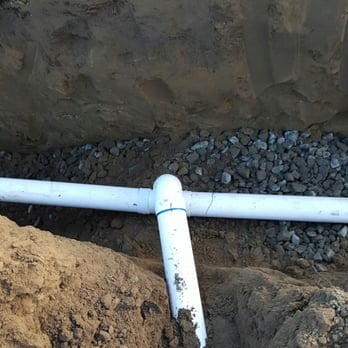 Brays Hoe Services - a pipe laying in the ground - General Contractors Near Me