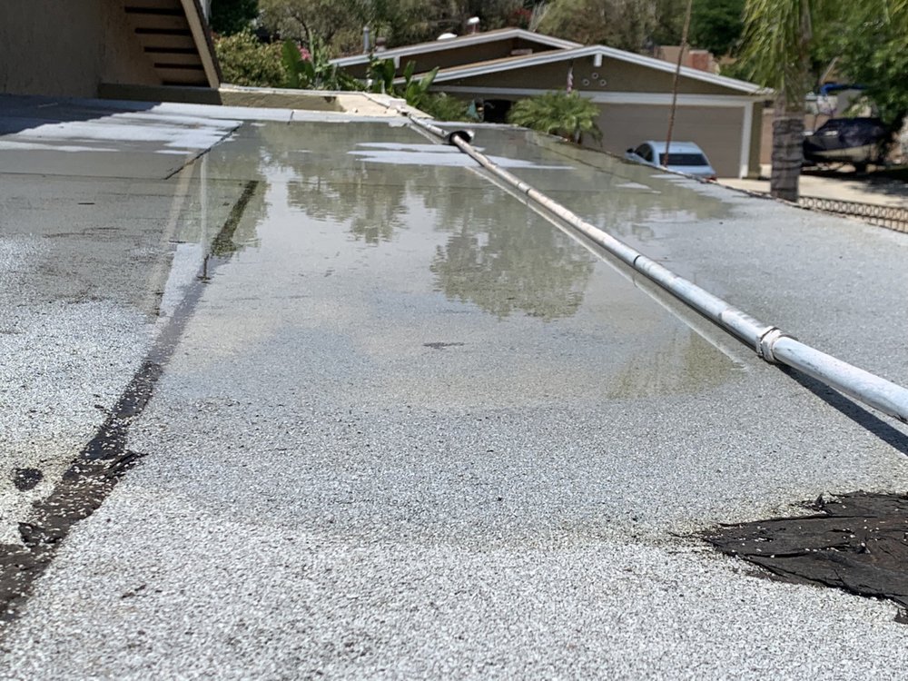 Slide of Ted Guilmette Roofing