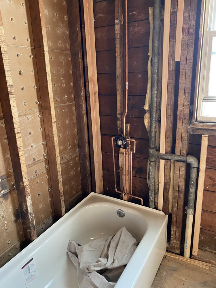 Slide of The in and out plumbing guy