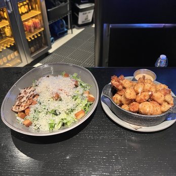 Guinness Open Gate Brewery - Chicken Cesar salad and cheese curds - Breweries Near Me - Chicago, Illinois Guinness Open Gate Brewery - Chicken Cesar salad and cheese curds - Breweries Near Me - Chicago, Illinois