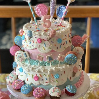 Oh Cake! - a birthday cake with lollipops on top - Desserts Near Me