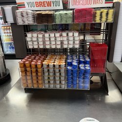7-Eleven - Well organized coffee creamers. Some 7-Eleven's just toss it in there. This place goes the extra mile to make it look classy.