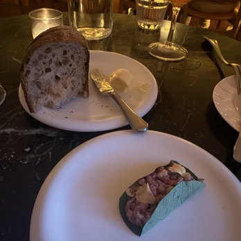 Maison Bar A Vins - Warm Manifest Bread (back); Dry Aged Beef Tartare (front) - Wine Bars Near Me - Washington, DC, District of Columbia