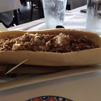 Malanga Cuban Cafe - This monster sandwich is their famous Pan con Lechon! - Cuban Near Me - Pinecrest, Florida Malanga Cuban Cafe - This monster sandwich is their famous Pan con Lechon! - Cuban Near Me - Pinecrest, Florida