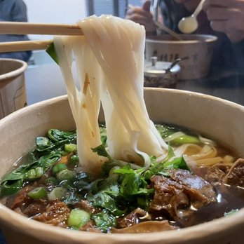 Qin West Noodle - Flat rice noodle pull from my bowl. I originally wanted their signature wide flat noodles but ended up with these noodles. - Chinese Near Me - Los Angeles, California Qin West Noodle - Flat rice noodle pull from my bowl. I originally wanted their signature wide flat noodles but ended up with these noodles. - Chinese Near Me - Los Angeles, California