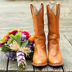 Richardson's Flowers - Bride's boots and wedding bouquet ready for her country style affair!