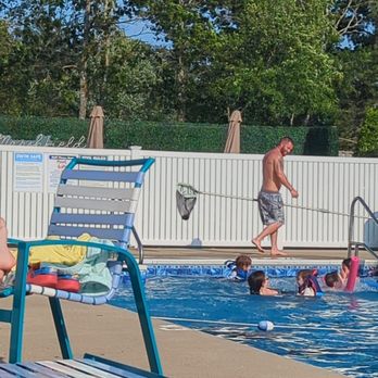 Village at Marshfield - A hot afternoon having fun at the pool - Apartments Near Me - Marshfield, Massachusetts