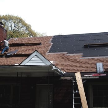 DBs Remodeling - two men working on a roof - General Contractors Near Me