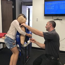 Rescue Squad CPR - Mr. Plummer training students in how to respond when someone is choking.