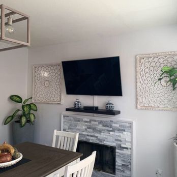 EV Charging Solutions - He installed the tv and ran the wire strip so no wires were visible. Also, he installed the wall art on each side of the tv. - Electricians Near Me EV Charging Solutions - He installed the tv and ran the wire strip so no wires were visible. Also, he installed the wall art on each side of the tv. - Electricians Near Me