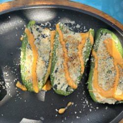 Turkey Point Hotel - Jalapeños that were raw drizzled with sriracha cheese, absolutely horrible