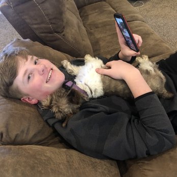 HOPE Dog Training - Snuggle time with brother - Pet Training Near Me HOPE Dog Training - Snuggle time with brother - Pet Training Near Me