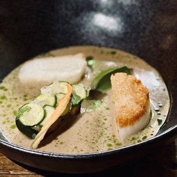 Masseria - a bowl of soup with scallops and cucumbers - Italian Near Me - Washington, DC, District of Columbia