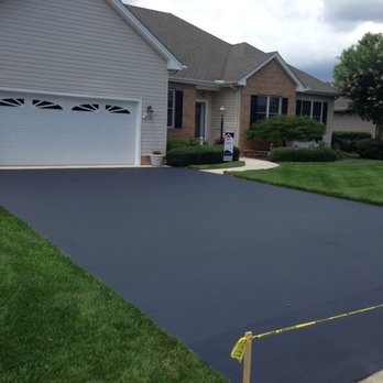 Surface Solutions - a driveway with a new tarmac - Masonry/Concrete Near Me - Eden, Maryland