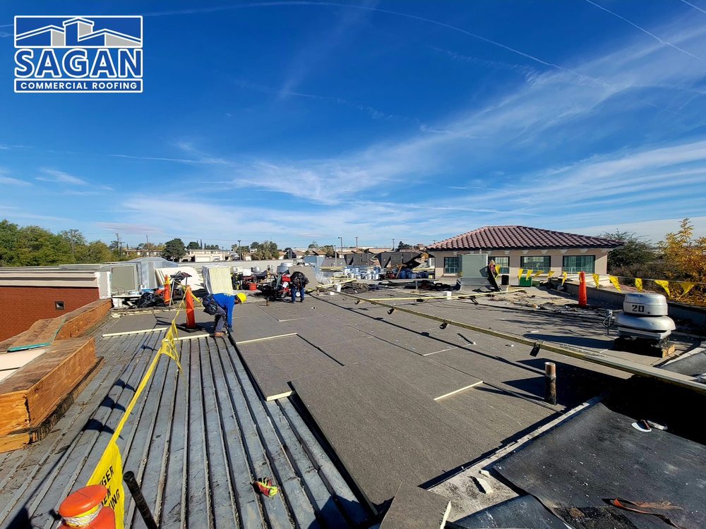 Slide of Sagan Commercial Roofing