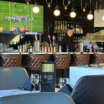 Show de Carnes - Not sure why they can't changed the station if they have NFL Networks on playing an old game from previous years!! I called BS!!!!! - Steakhouses Near Me - Sausalito, California