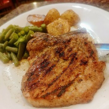 Grandma's Table - Greek pork chop and Greek potatoes. ©hungryhaus - Breakfast & Brunch Near Me - Montgomery, Illinois Grandma's Table - Greek pork chop and Greek potatoes. ©hungryhaus - Breakfast & Brunch Near Me - Montgomery, Illinois