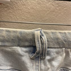 Phoenix Custom Tailors - Hidden seam under belt loops for altered waistline of taking in jeans to fit - alterations from size US 14 to about an 8/10 - [~$30ish]