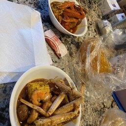 Red Bomb Garlic Butter and Cajun w/ Mild Spice Red Bomb Garlic Butter and Cajun w/ Mild Spice